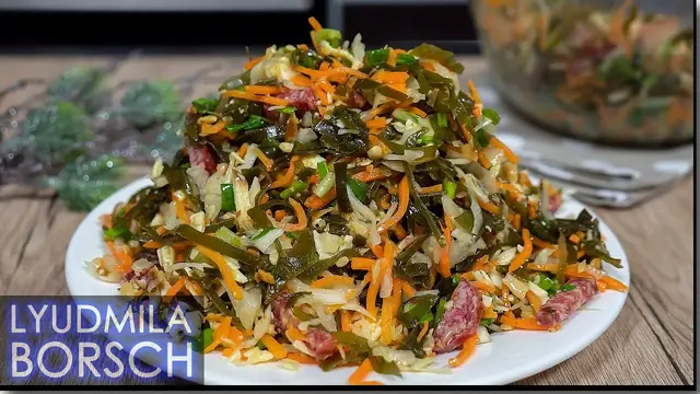 Салат с морковью по-корейски, квашеной капусты и колбасы