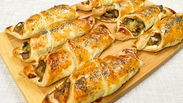 Закуска с грибами и рыбой из слоёного теста 