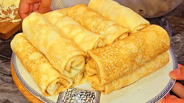 Блинчики с курицей, грибами и сливочным соусом