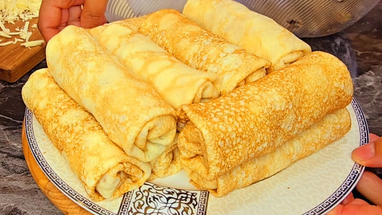 Блинчики с курицей, грибами и сливочным соусом