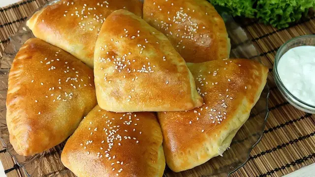 Вкуснейшие пирожки с мясом в духовке