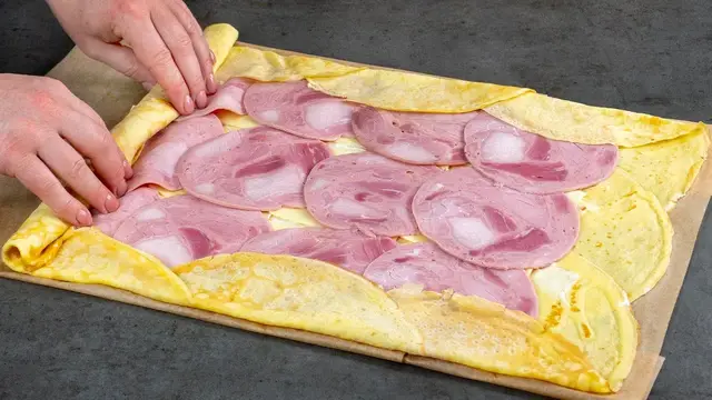 Блинный рулет с ветчиной в духовке