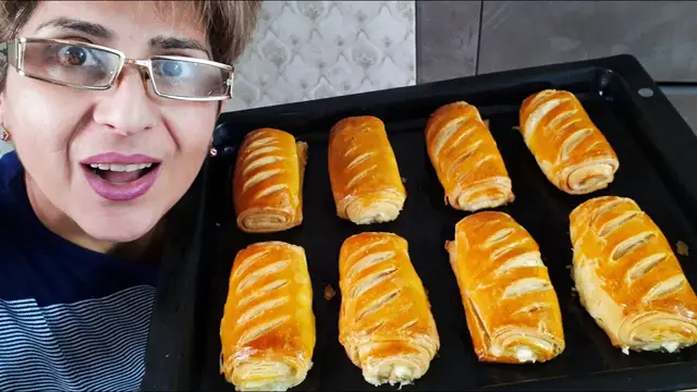 Слоёные рулетики с сыром и творогом на кефирном тесте