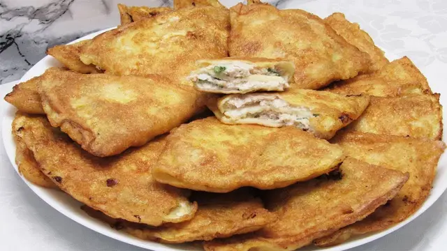 Тонкие блины с мясной начинкой
