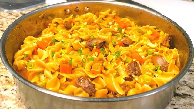 Макароны с куриными сердечками на сковородке
