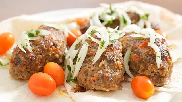 Котлеты из фарша с овощами в духовке