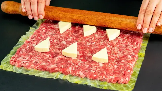 Капустные рулеты с мясной начинкой и плавленым сыром