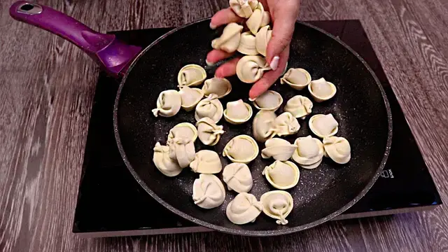 Пельмени в сливочном соусе 