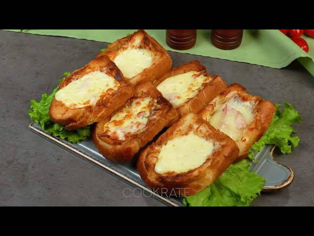 Горячие хлебные лодочки с сыром и ветчиной