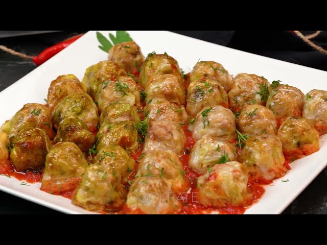 Капустные голубцы с мясом, рисом и грибами под соусом