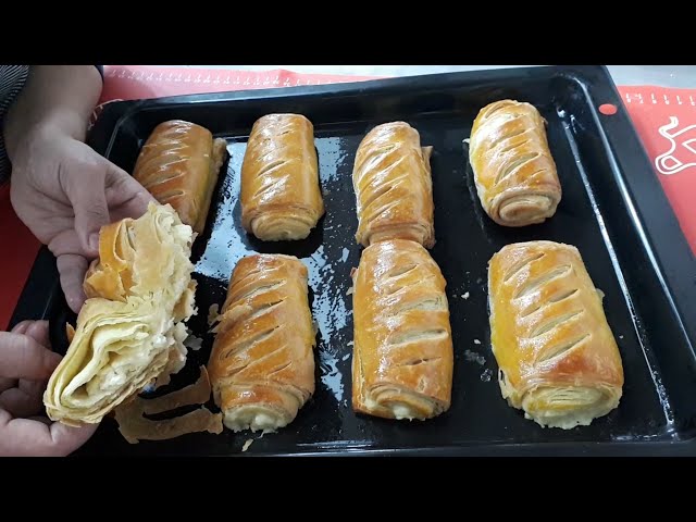 Слоёные рулетики с сыром и творогом на кефирном тесте