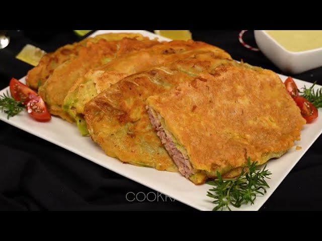 Биточки из капусты с мясным фаршем и сырным соусом