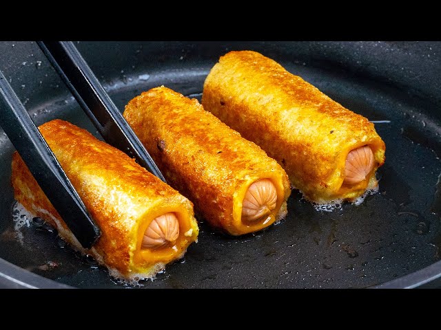Горячие рулетики из хлеба с сыром и сосисками